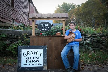 Graves Glen Farm boy with Hen